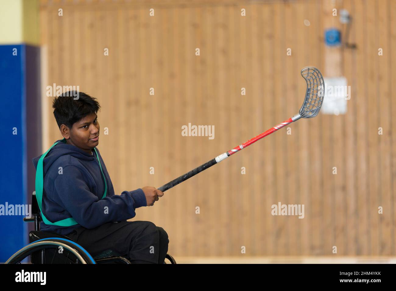Disabled young man in gym Stock Photo