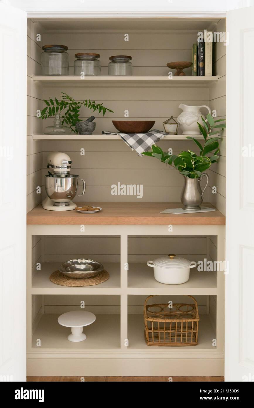 Pretty kitchen shelves in natural colors Stock Photo - Alamy