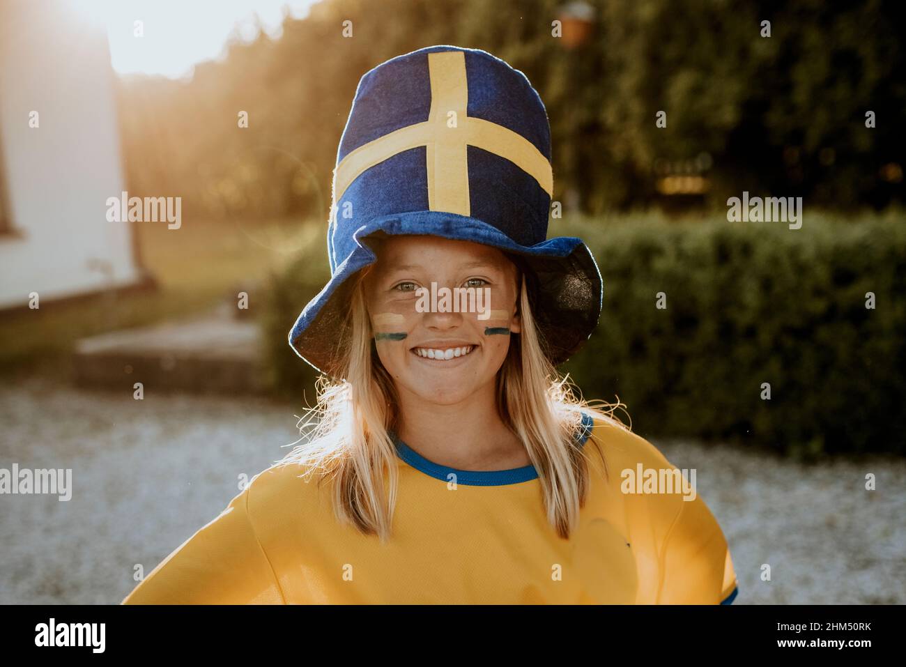 Smiling girl looking at camera Stock Photo