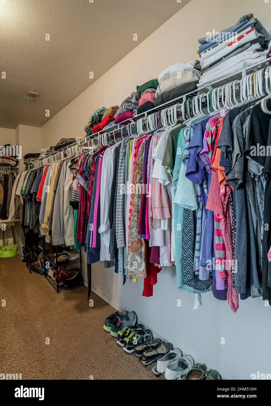 Walk in wardrobe with clothes and shoes hi-res stock photography and images  - Alamy
