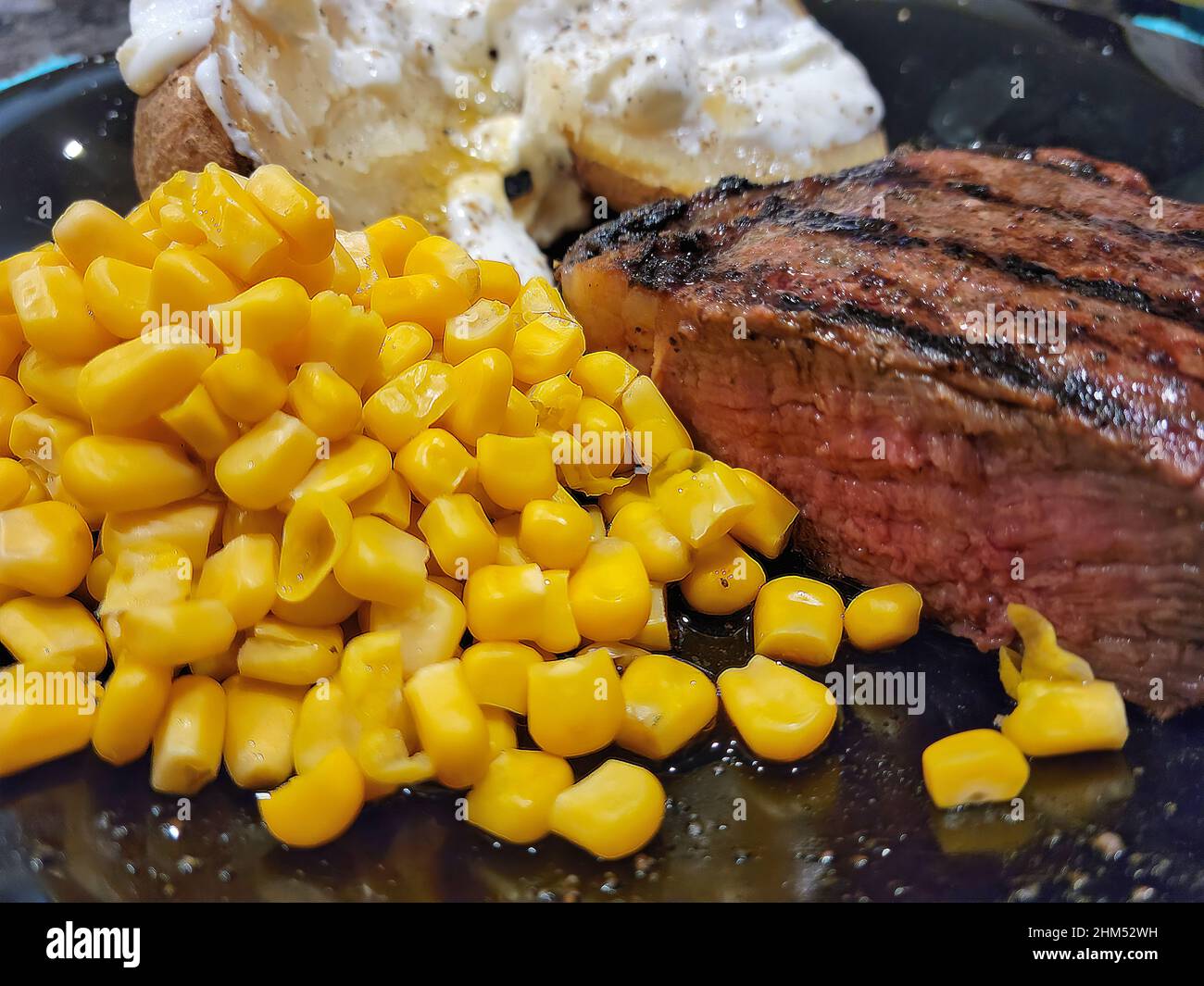 Grilled beef steak baked potato hi-res stock photography and images - Alamy