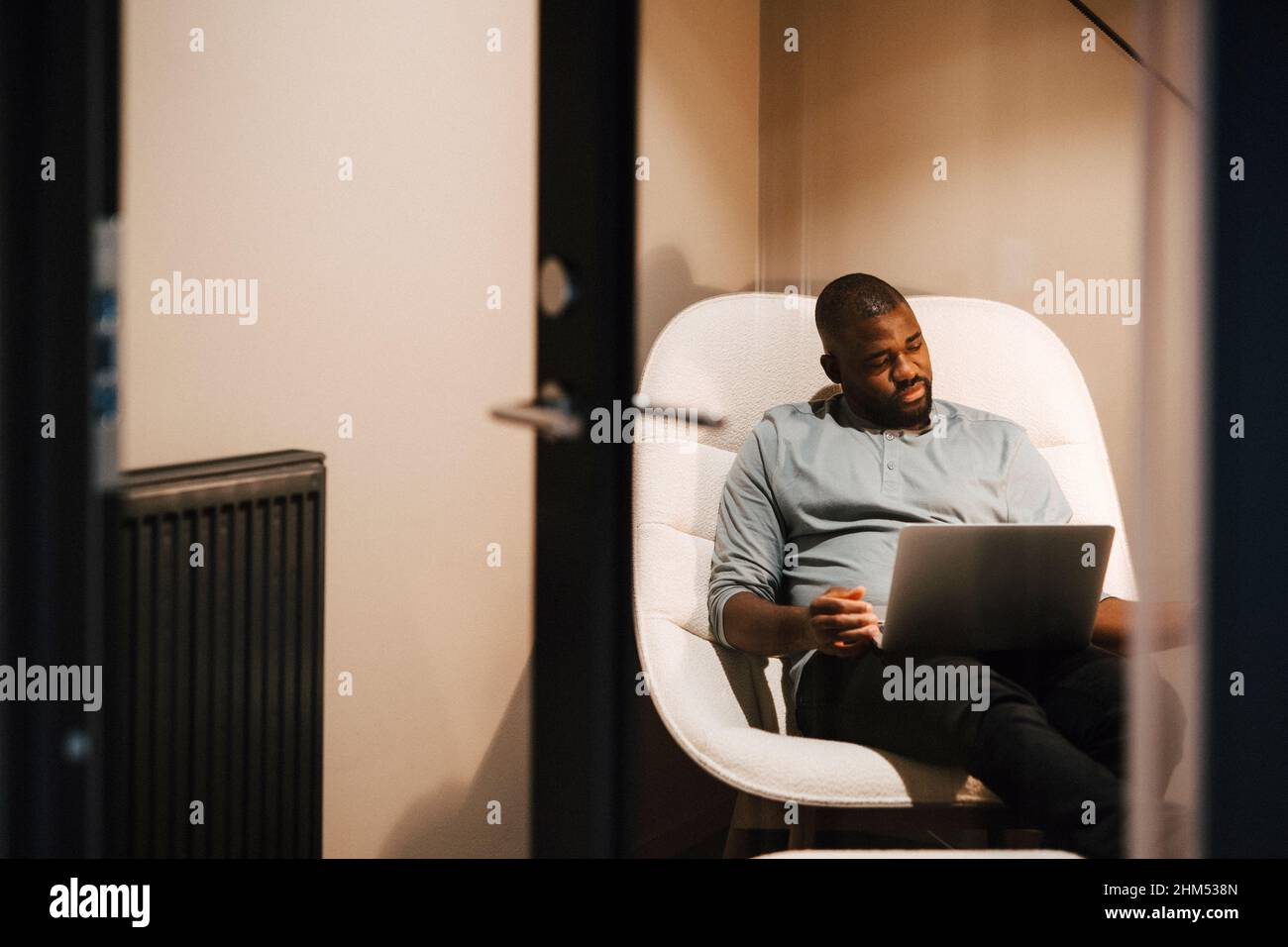 Man using laptop Stock Photo