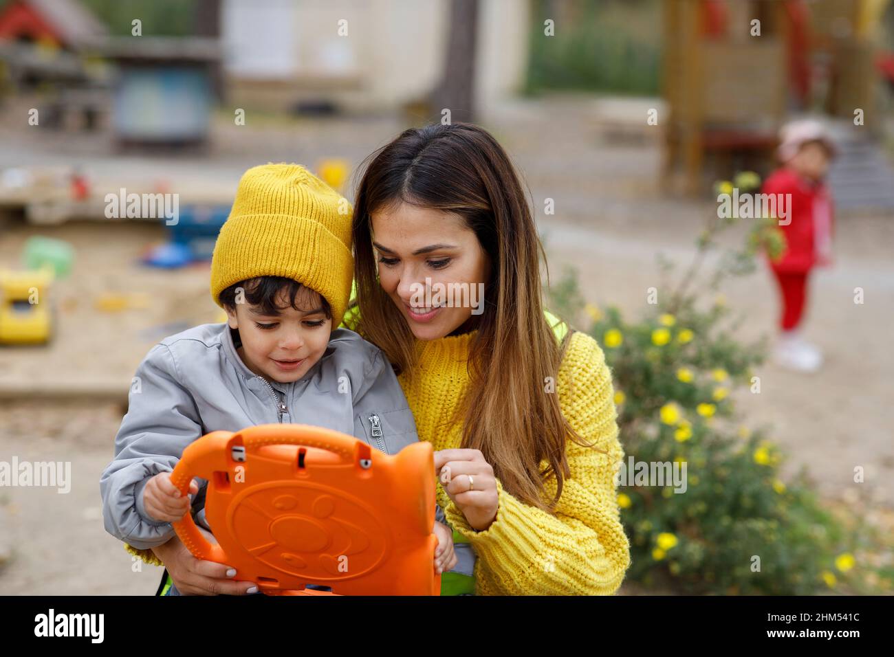 Woman with son using digital tablet Stock Photo