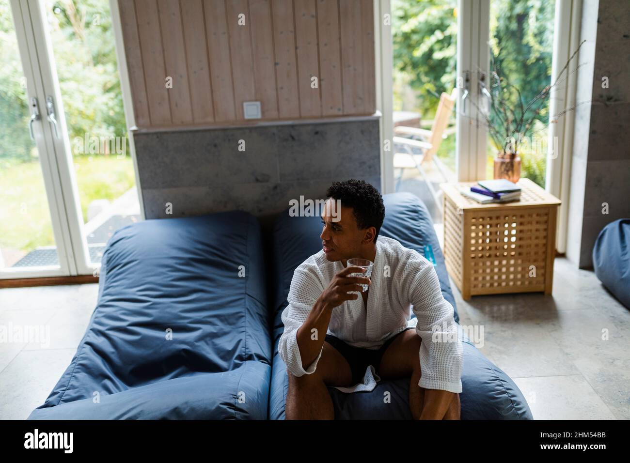 Man sitting on bean bag hi-res stock photography and images - Alamy
