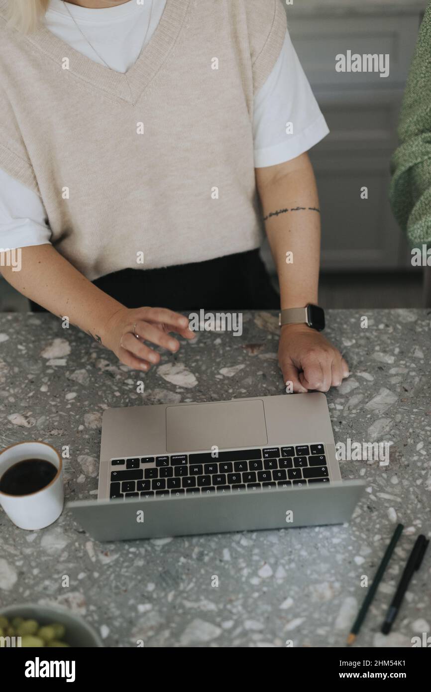 Woman using laptop Stock Photo