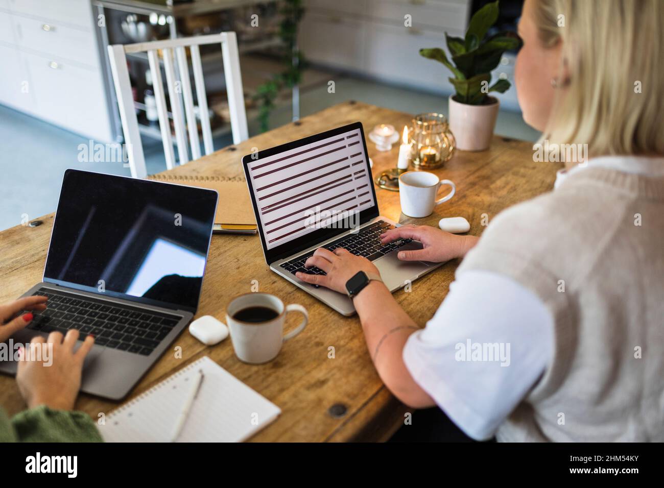 High angle view of women using laptops Stock Photo