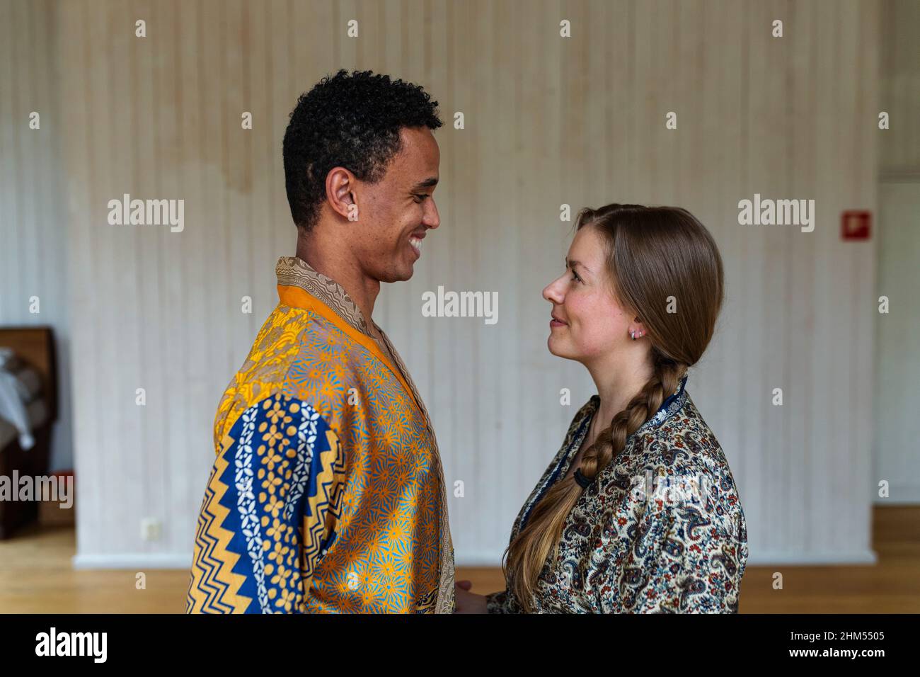 Smiling couple in yoga studio Stock Photo