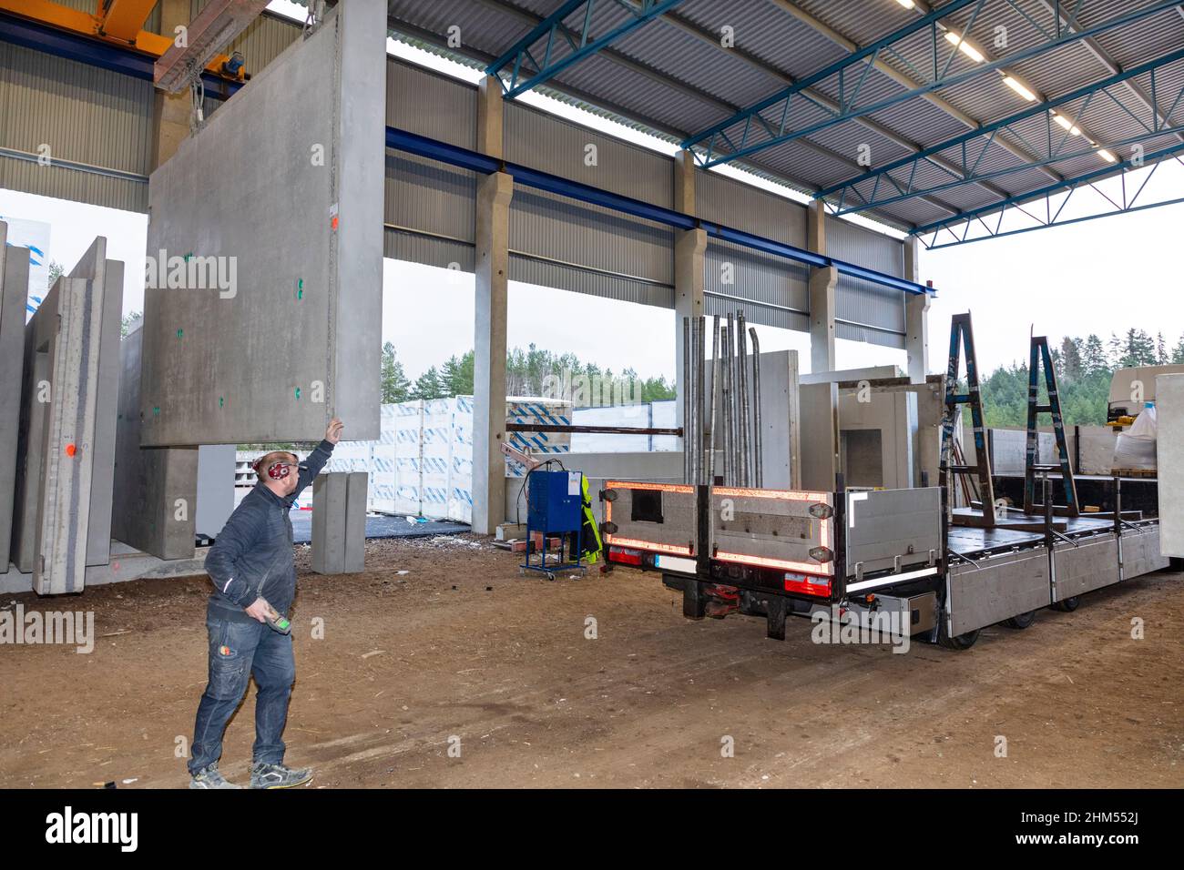 Man working in industrial warehouse Stock Photo