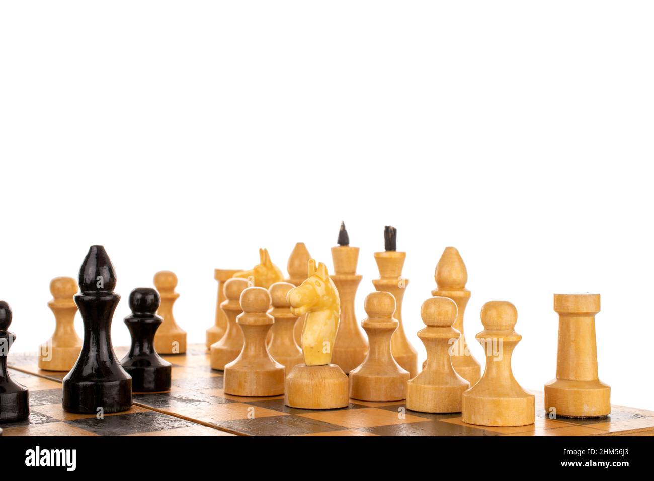 Ancient wooden chess pieces on an old chessboard Stock Photo - Alamy