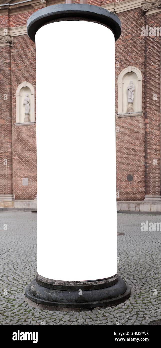 empty advertising pillar in an ancient city with free copy space, promotion mockup Stock Photo