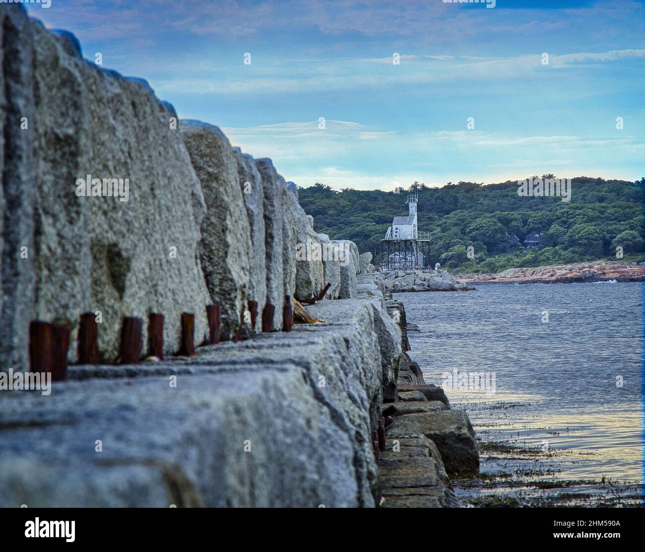 Beautiful view of the breakwater at Harbor lighthouse, Gloucester, Ma ...