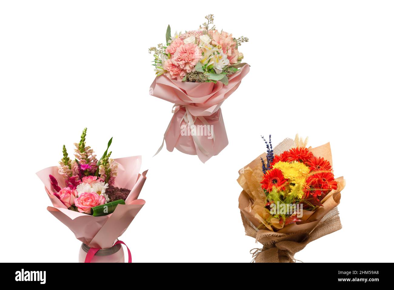 Premium Photo  Bouquet of soft pink flowers in pink wrapping paper in  woman hands isolated on white surface.