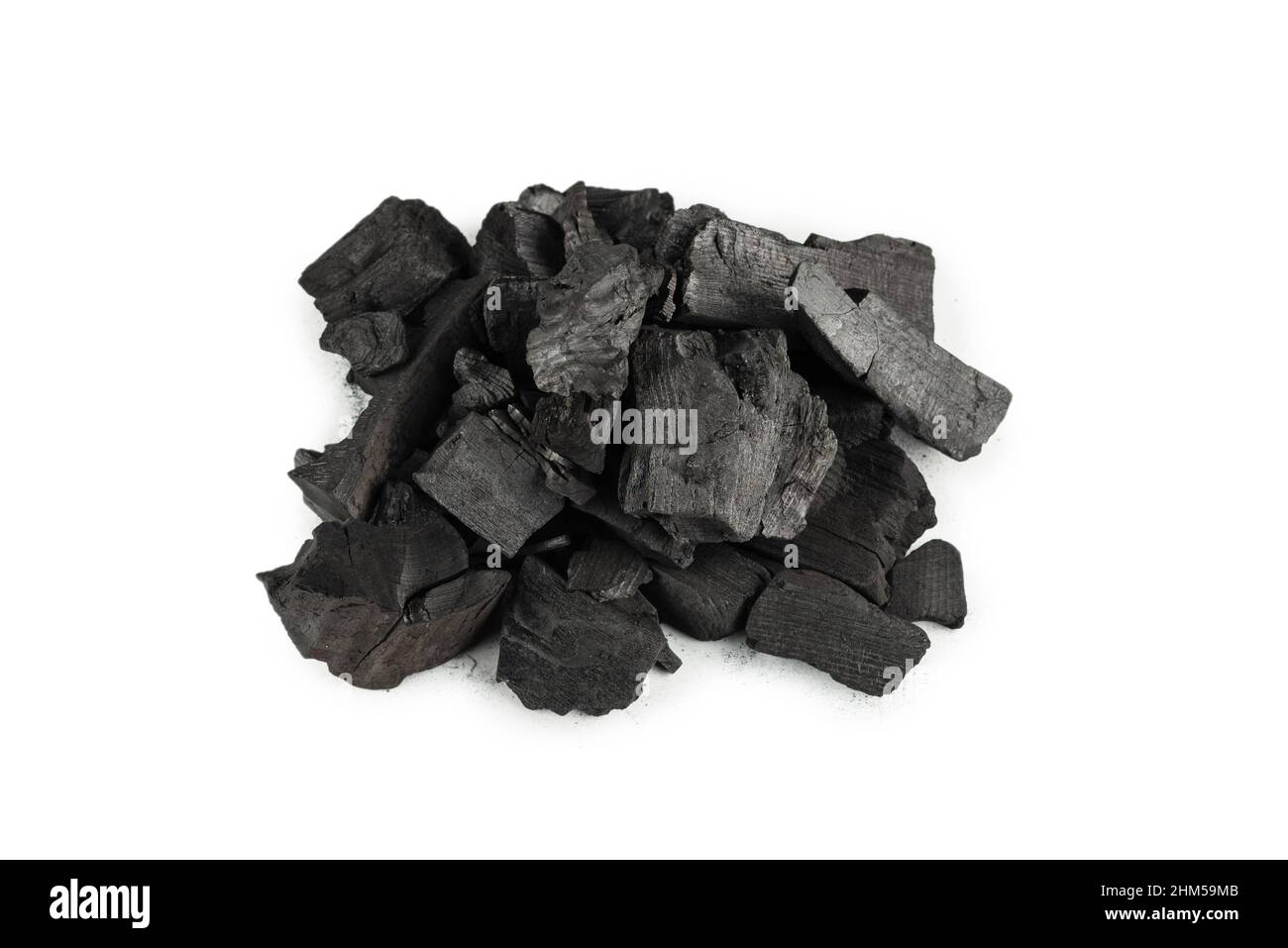 Black oak coal isolated on a white background. Stock Photo