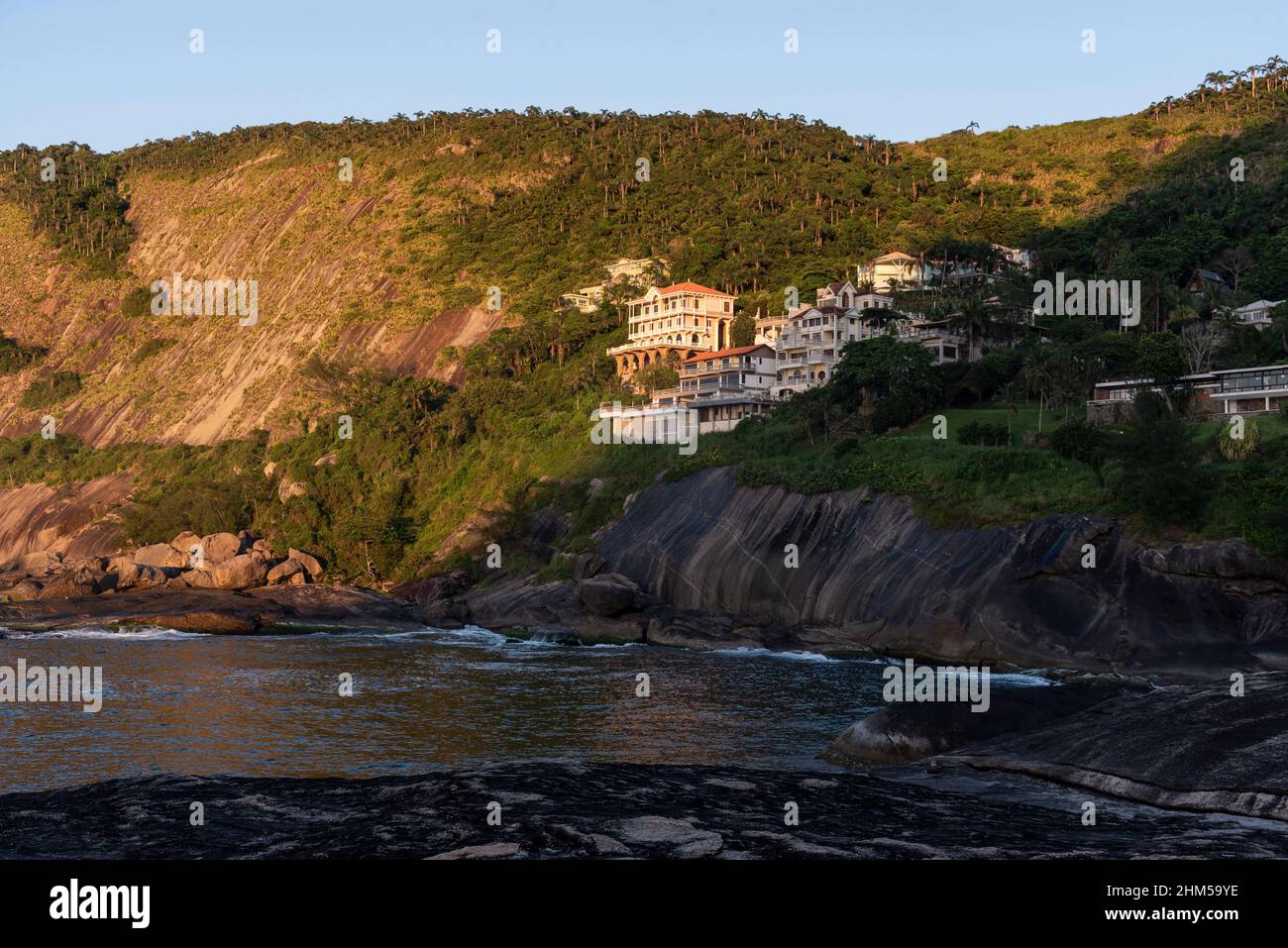 Beautiful view to rich houses on beach rainforest hill side Stock Photo