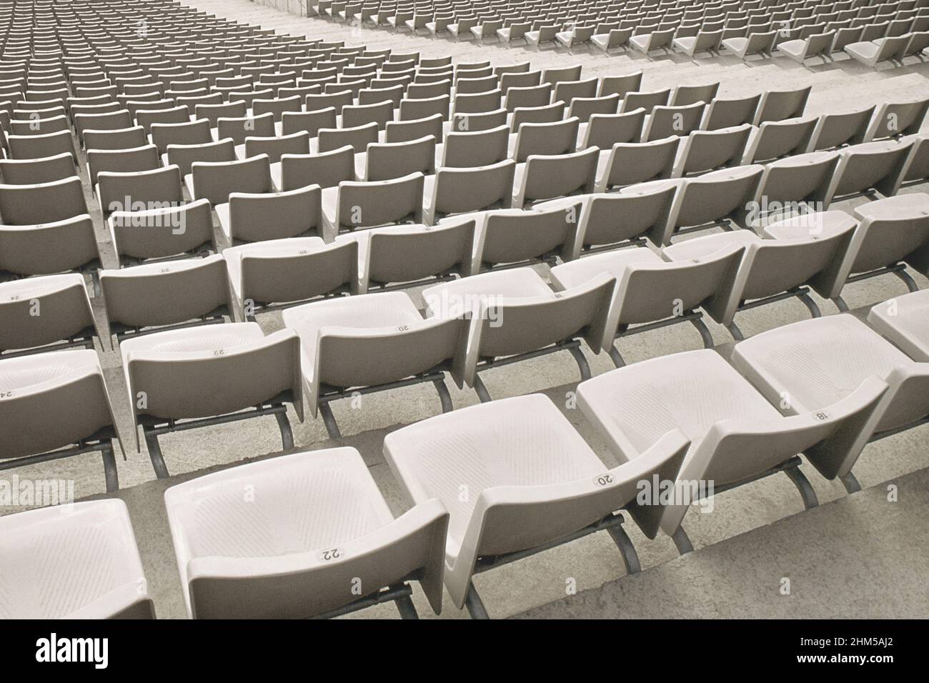 Empty rows of seats in sports stadium, Barcelona, Spain.Olympic stadium Parc de Montjuic, Landmark nobody Stock Photo