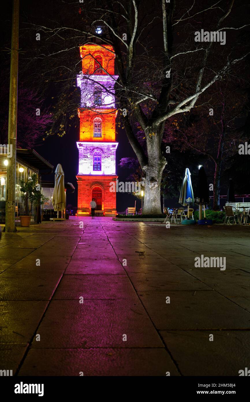 Low angle view of Tophane tower in Bursa, night photo of bursa and illuminated ancient clock tower Stock Photo