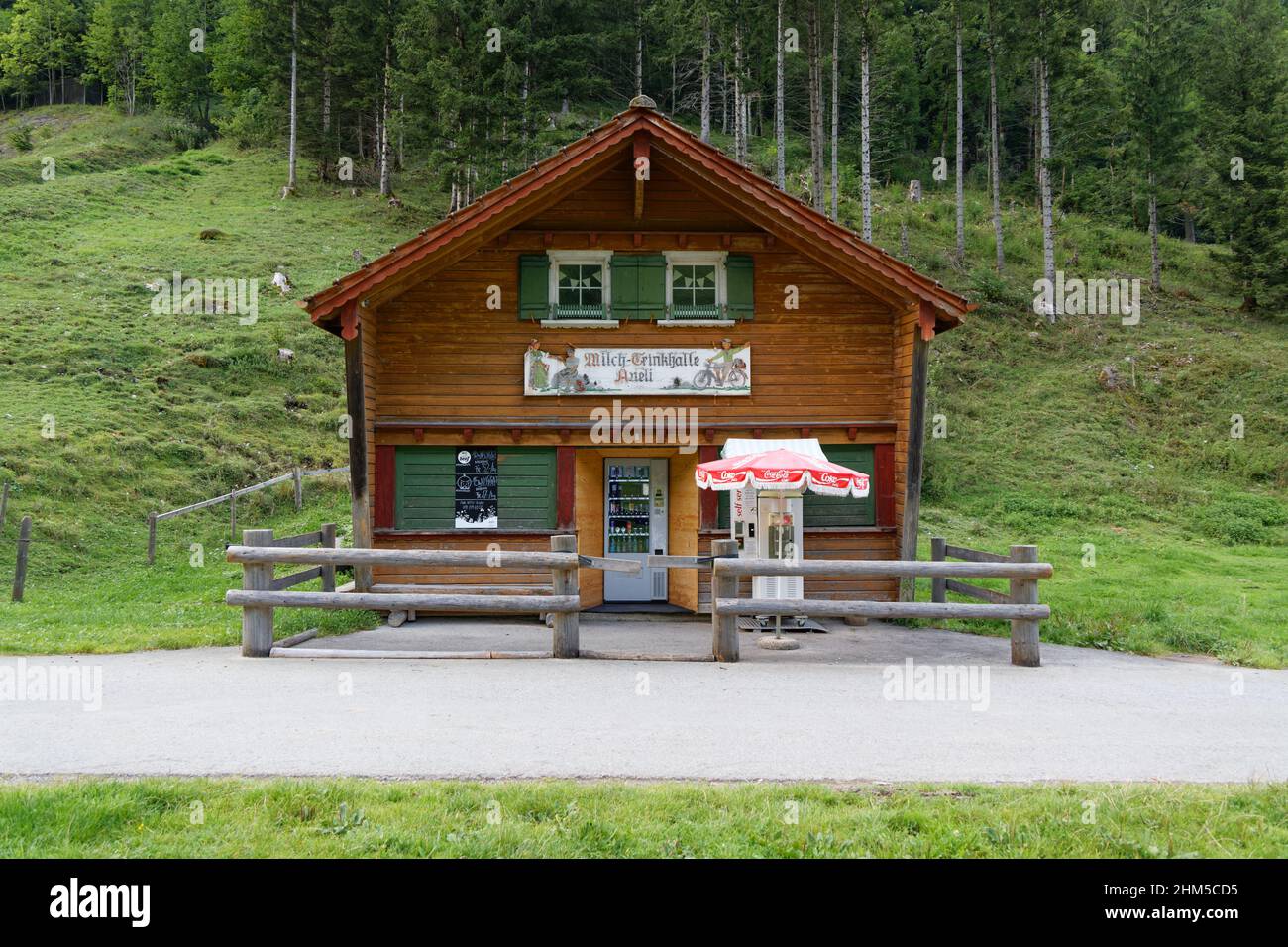 08.19.2021 milk drinking hall lake alp switzerland: self-service food station, snacks, sweets, soft ice cream, meat, drinks coin insertion required, o Stock Photo