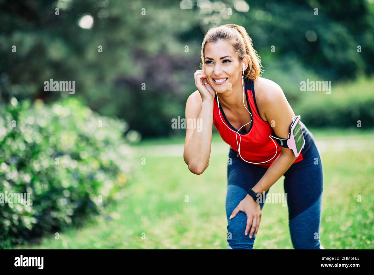 fitness woman park exercise lifestyle outdoor sport healthy female nature active young fit training athlete Stock Photo