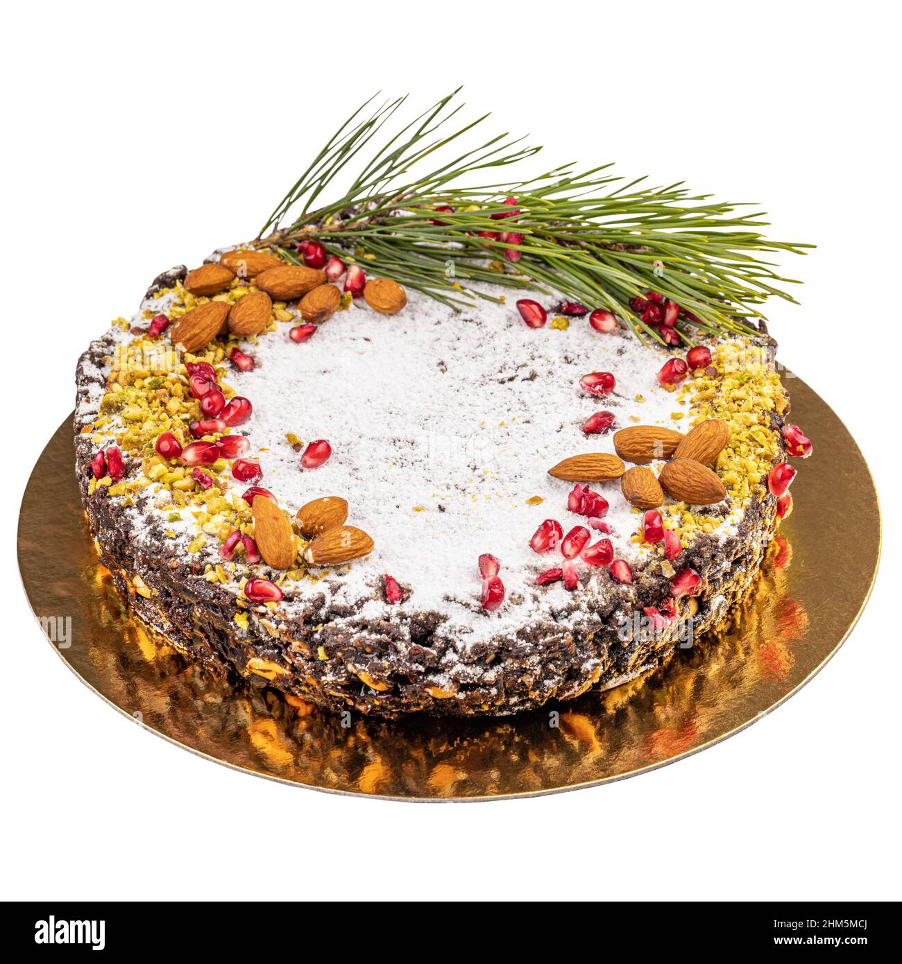 Traditional Italian Christmas panforte cake with fruits and nuts isolated on white background Stock Photo