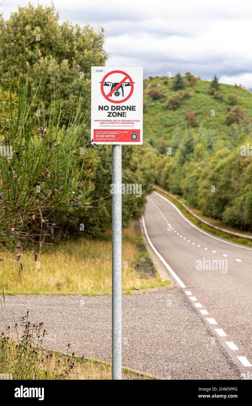 Sign forbidding flying of drones on the Rosneath Peninsula nr Mambeg on the other side of Gare Loch from HMNB Clyde nuclear submarine base at Faslane. Stock Photo