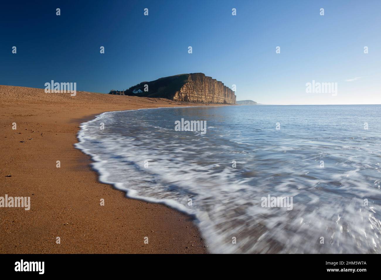 West Bay with the East Cliffs in the distance, part of the Jurassic Coast World Heritage Site. Dorset, UK. Stock Photo
