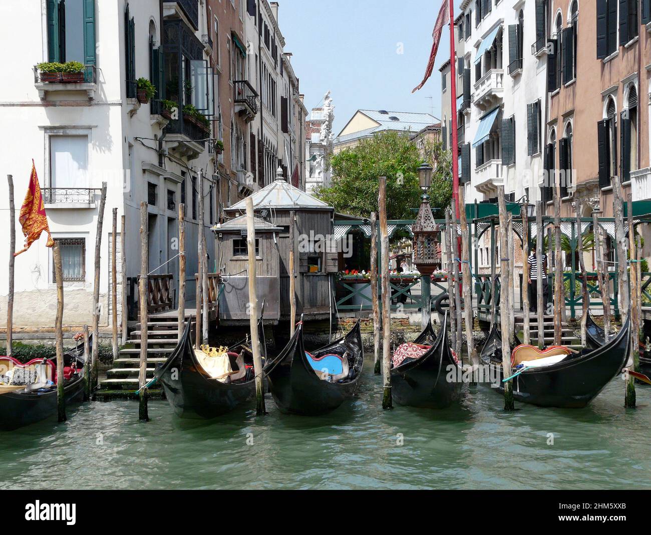 Gondolas at Canale Grande in Venice. The black gondolas are part of the