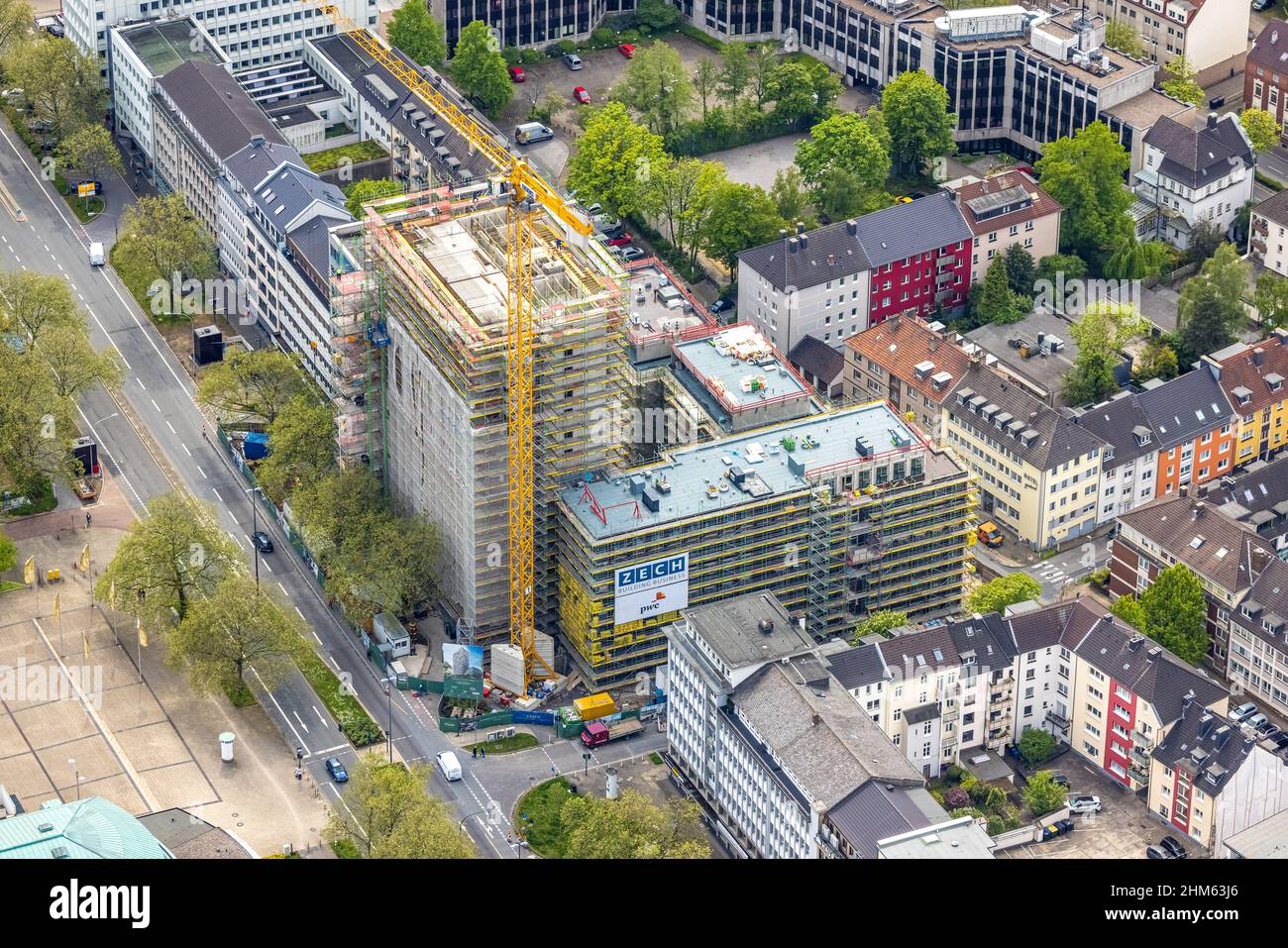 Aerial view, construction site of new building complex with residential tower and senior flats Huyssenallee, Essen, Ruhr area, North Rhine-Westphalia, Stock Photo