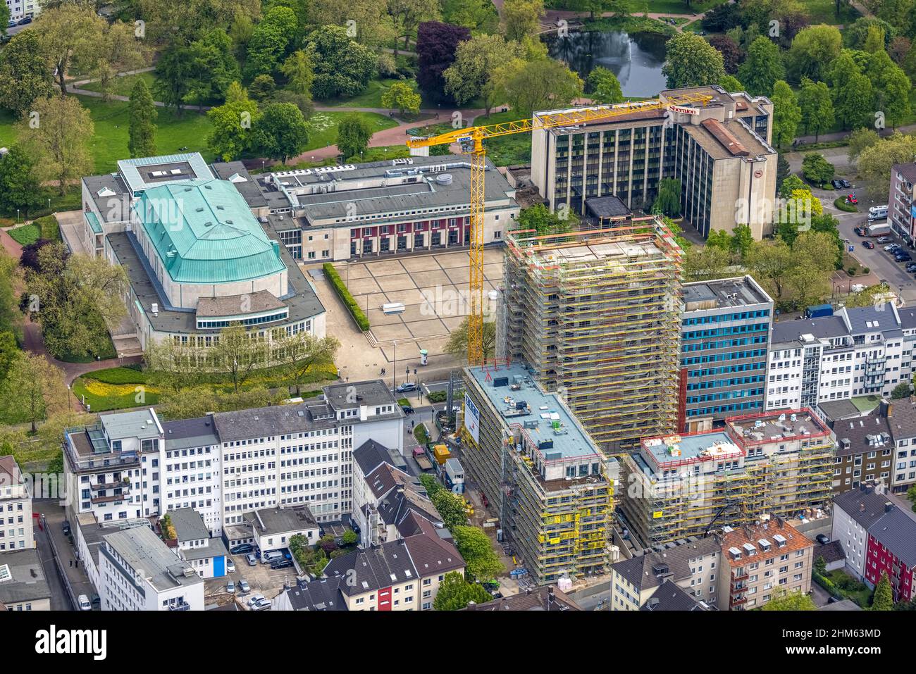 Aerial view, Philharmonie Essen at Huyssenallee, construction site new building complex with residential tower and senior flats Huyssenallee, Essen, R Stock Photo