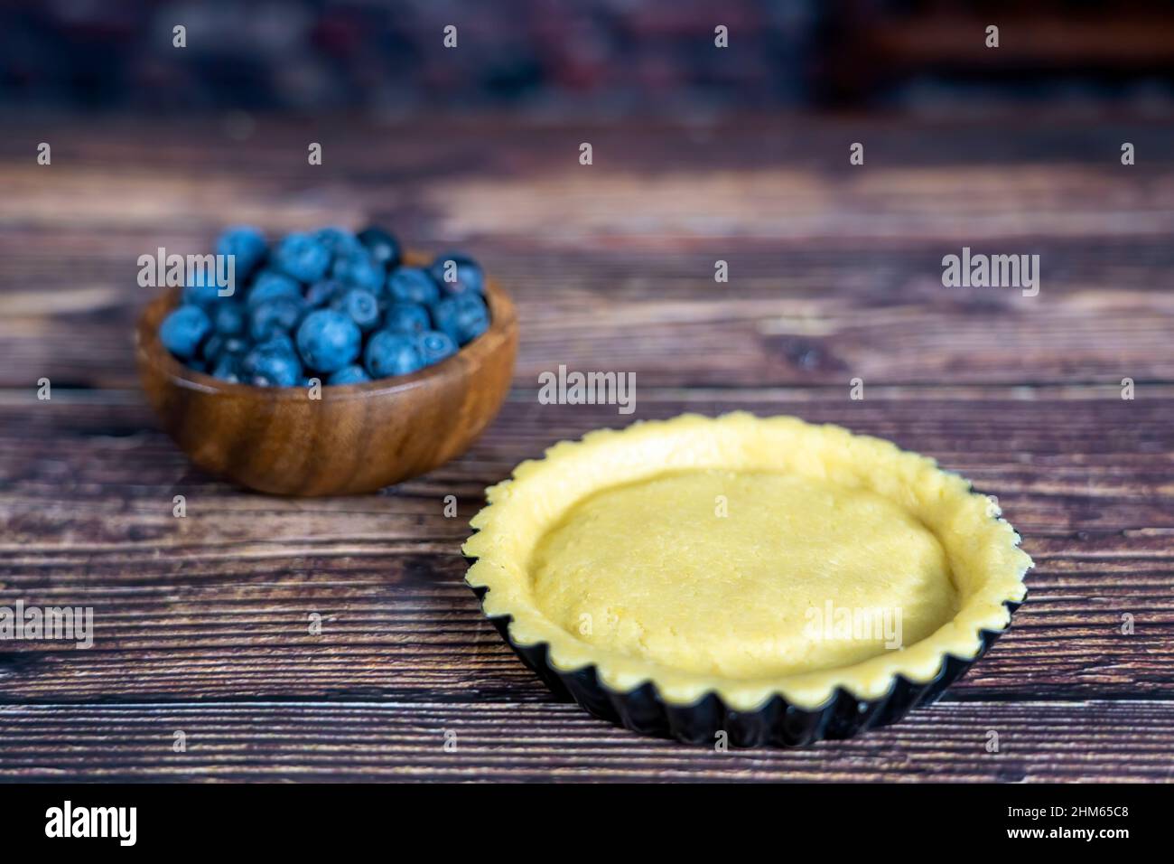 Delicious Blue berry tart or pie large  on wood table background. Stock Photo