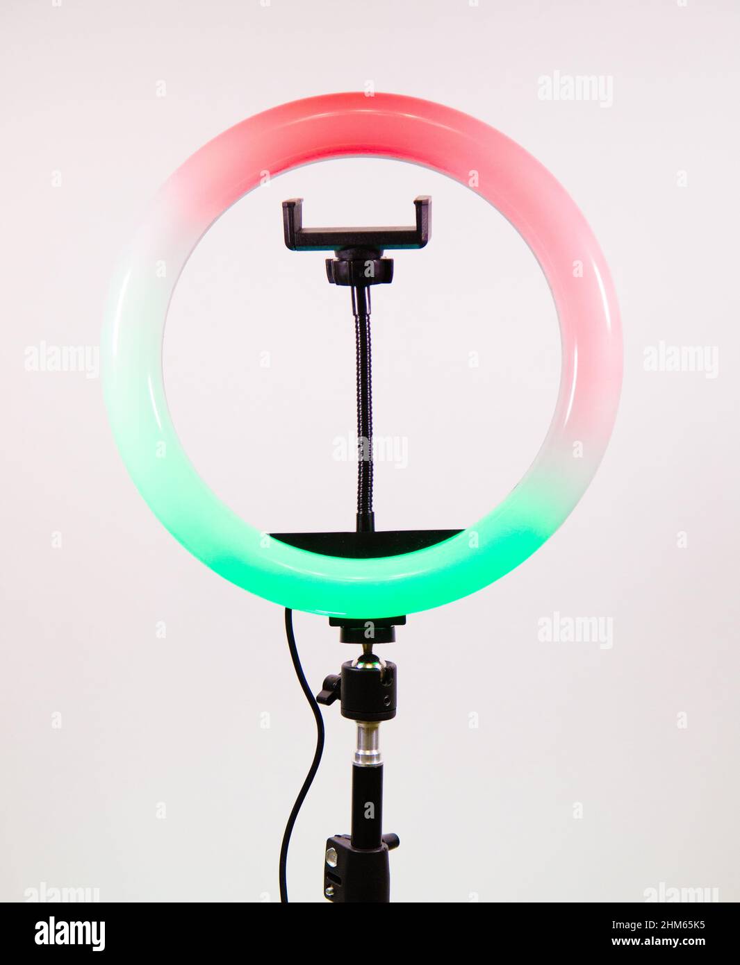 Ring lamp shines in two colors. Red and green Stock Photo - Alamy