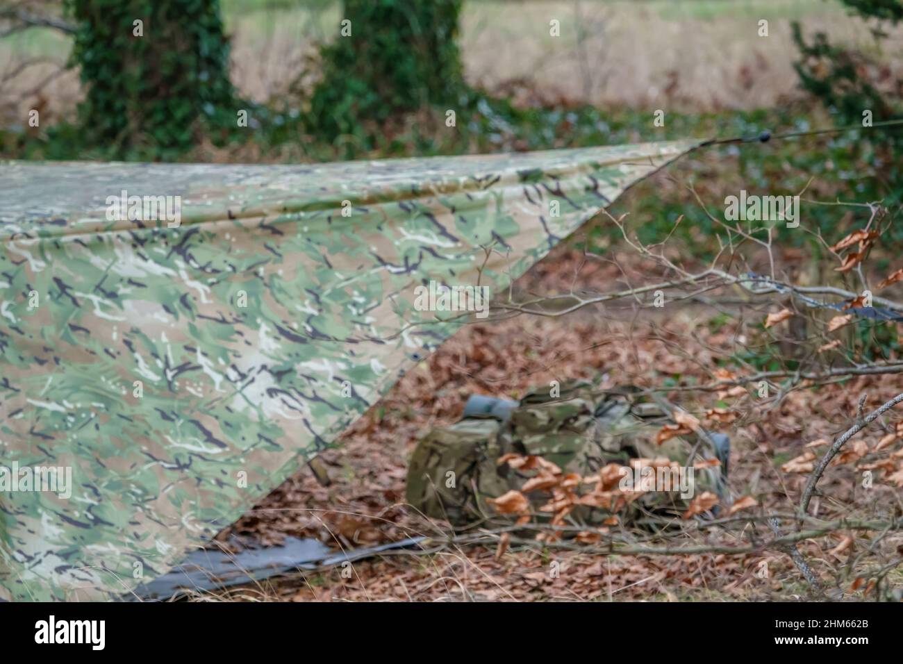 British Army Soldier Camouflage Temporary Tent Cover Erected Amongst A british-army-soldier-camouflage-temporary-tent-cover-erected-amongst-a