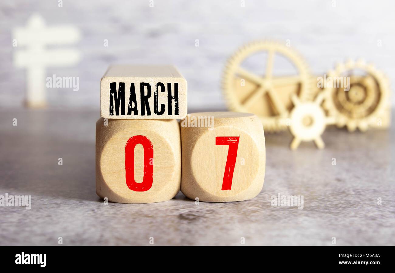 Day 7 of March month, Wooden calendar with date. Empty space for text. Stock Photo