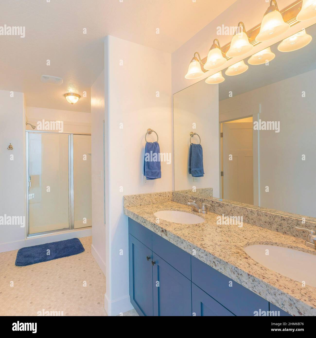 Square Master bathroom interior with purple and beige tones Stock Photo