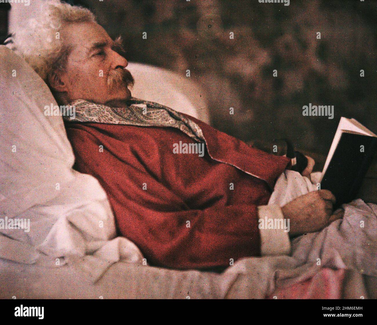 The american writer Mark Twain (real name Samuel Clemens), author of Tom Sawyer and Huckleberry Finn. The photo (taken by the autochrome process) is from 1908 when the author was 72. Stock Photo