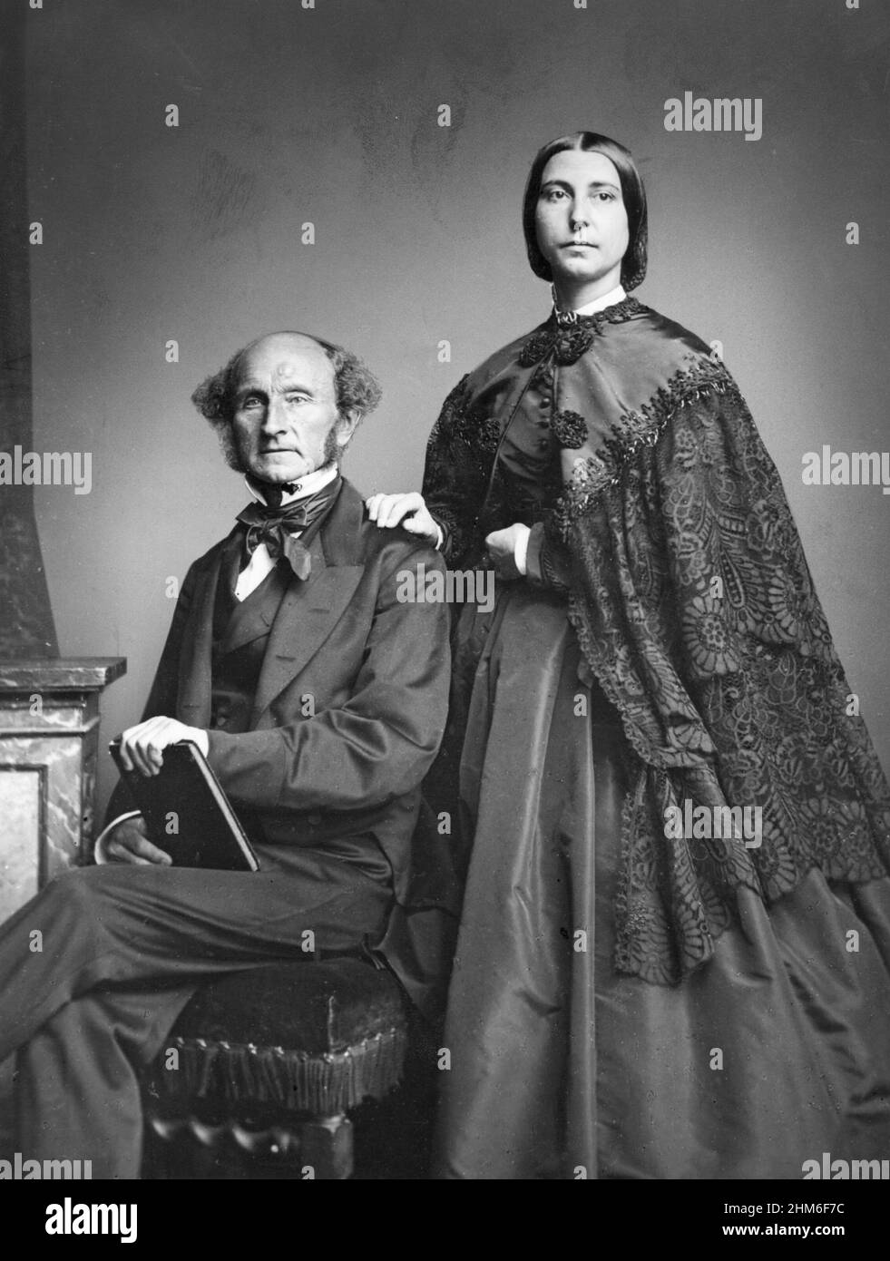 John Stuart Mill and Helen Taylor. Helen was the daughter of Harriet Taylor and collaborated with Mill for fifteen years after her mother's death in 1858. Stock Photo