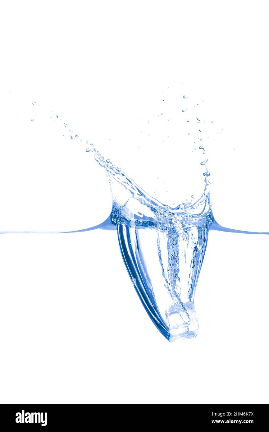 Falling of ice cube into clean water on white background Stock Photo ...