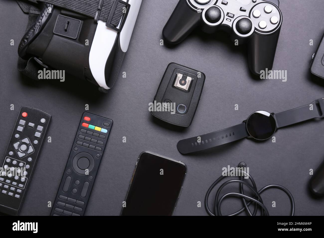 Different modern gadgets on dark background Stock Photo