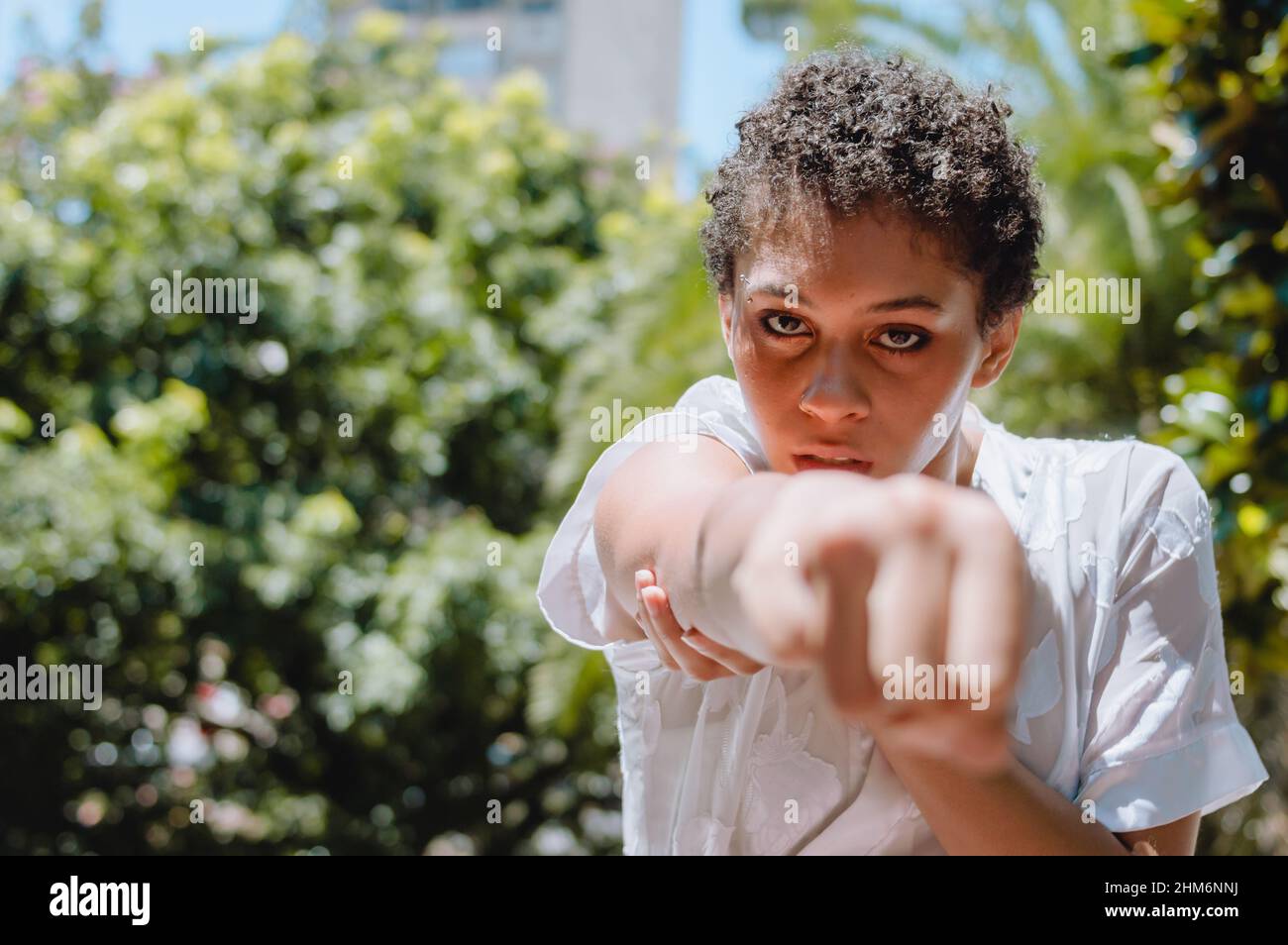 portrait of strong young hispanic latin woman in from view