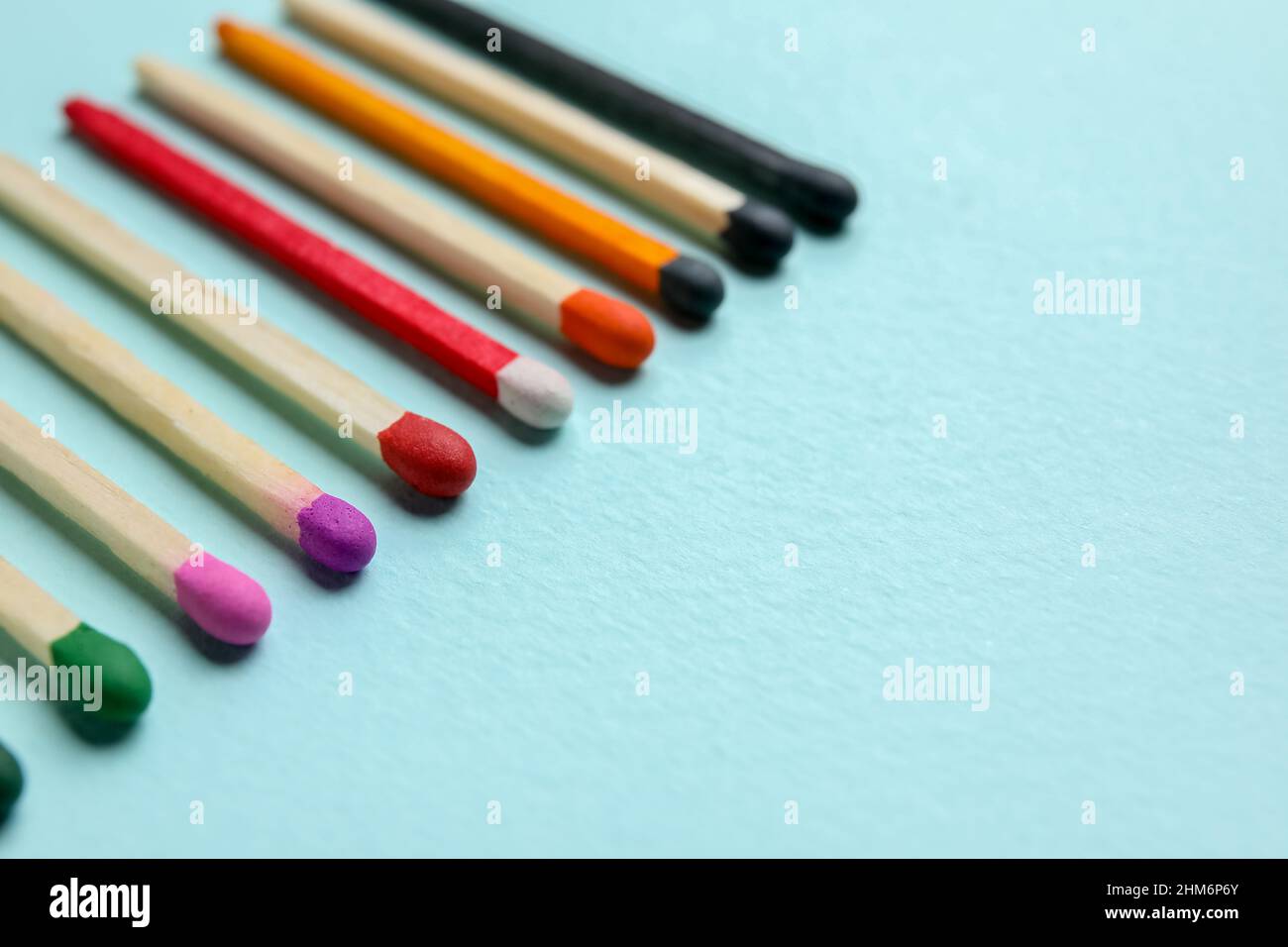 Matchstick Names Different new matchsticks on blue background, closeup Stock Photo - Alamy