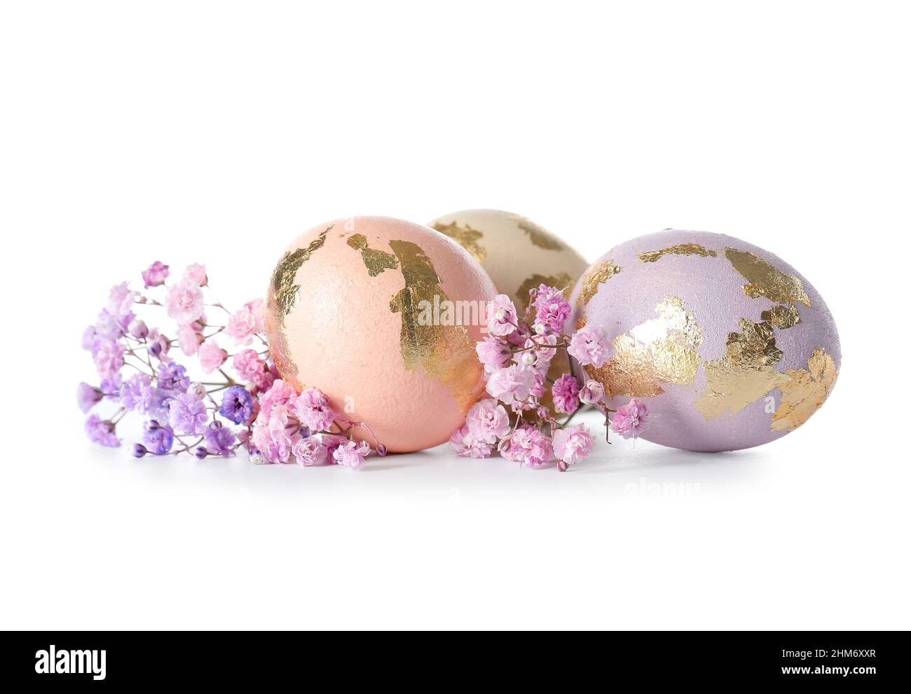 Beautiful Easter eggs and gypsophila flowers on white background Stock ...