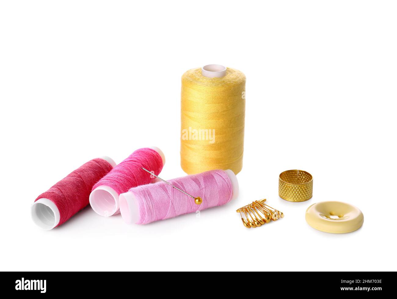 Sewing set on white background Stock Photo - Alamy