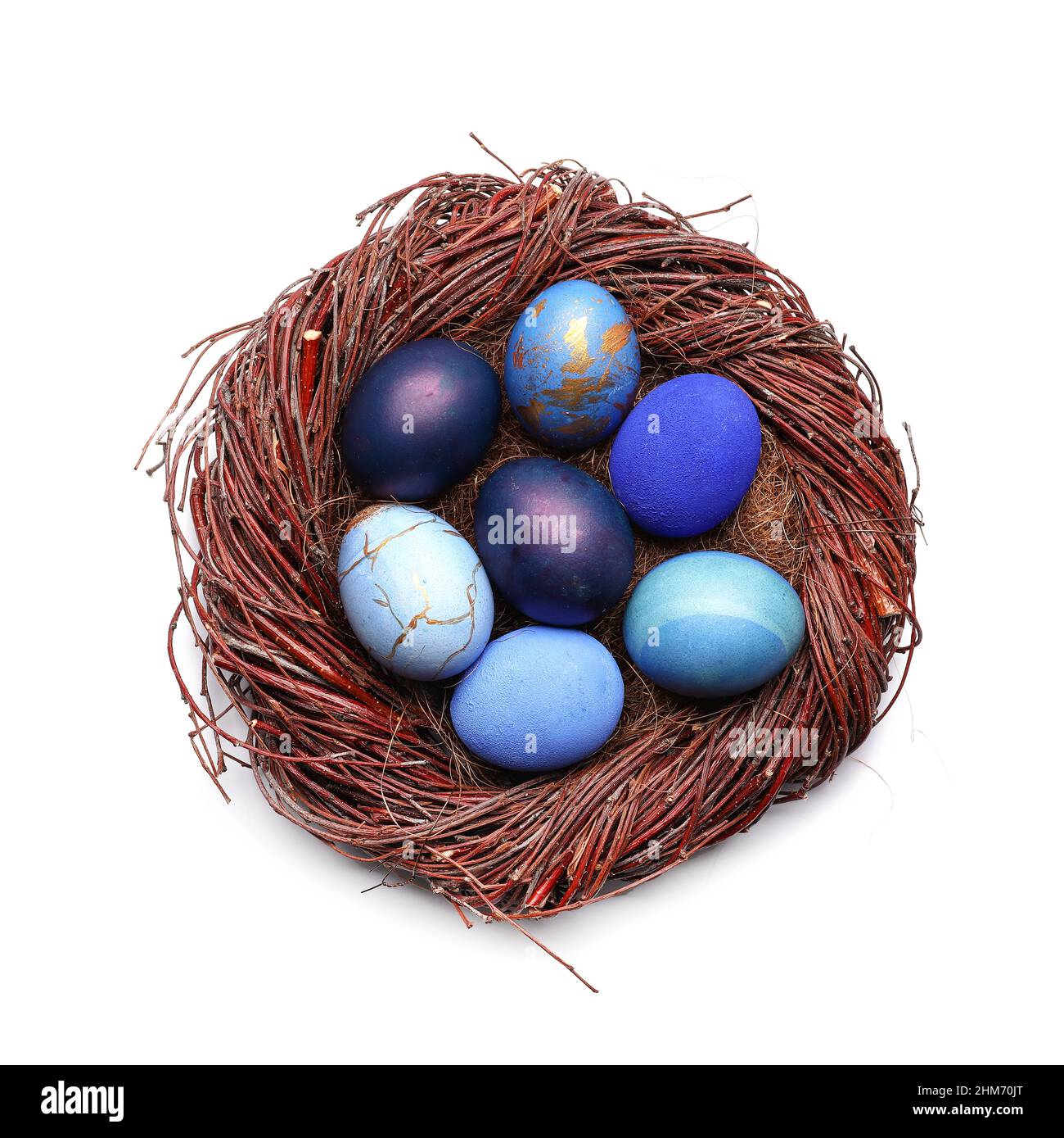 Nest with beautiful Easter eggs isolated on white background Stock ...