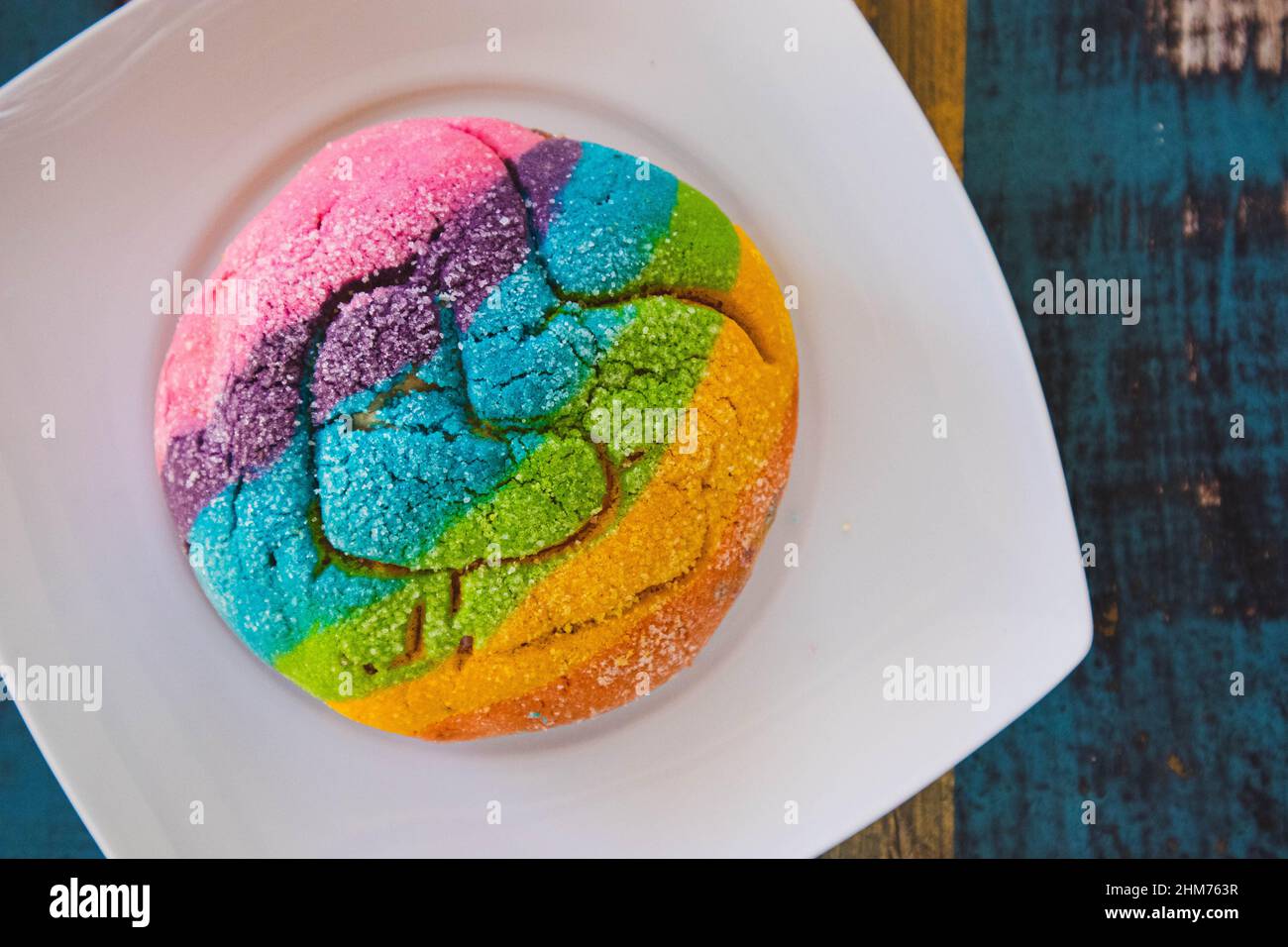 Rainbow Concha with a Heart. Mexican sweet bread with rainbow top Stock