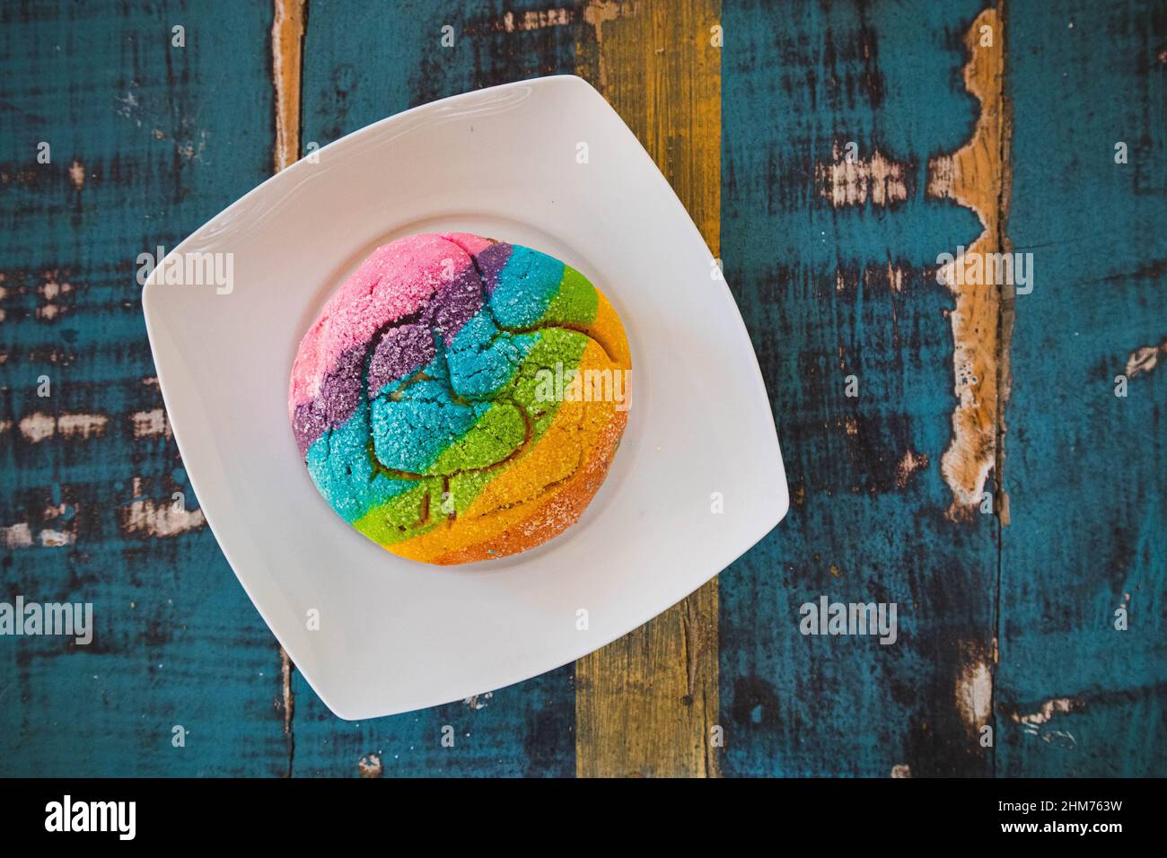 Rainbow Concha with a Heart. Mexican sweet bread with rainbow top Stock