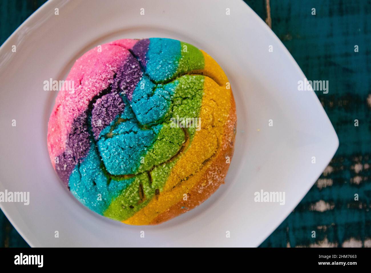 Rainbow Concha with a Heart. Mexican sweet bread with rainbow top Stock