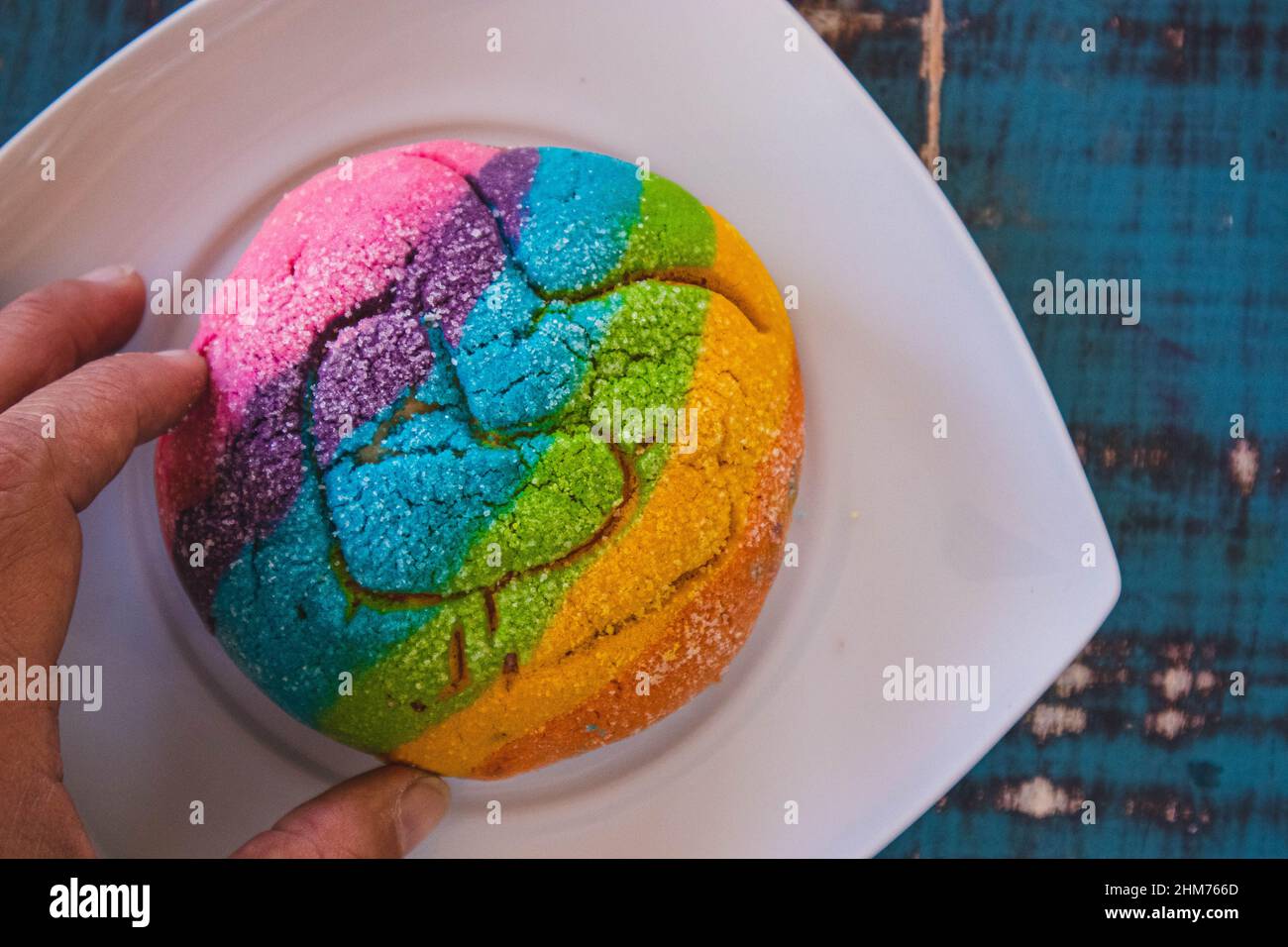 Rainbow Concha with a Heart. Mexican sweet bread with rainbow top Stock