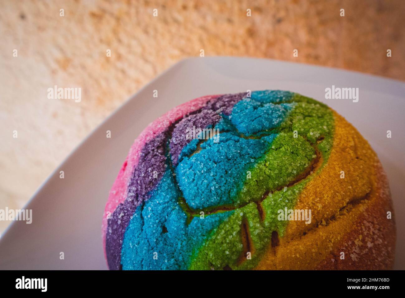 Rainbow Concha with a Heart. Mexican sweet bread with rainbow top Stock