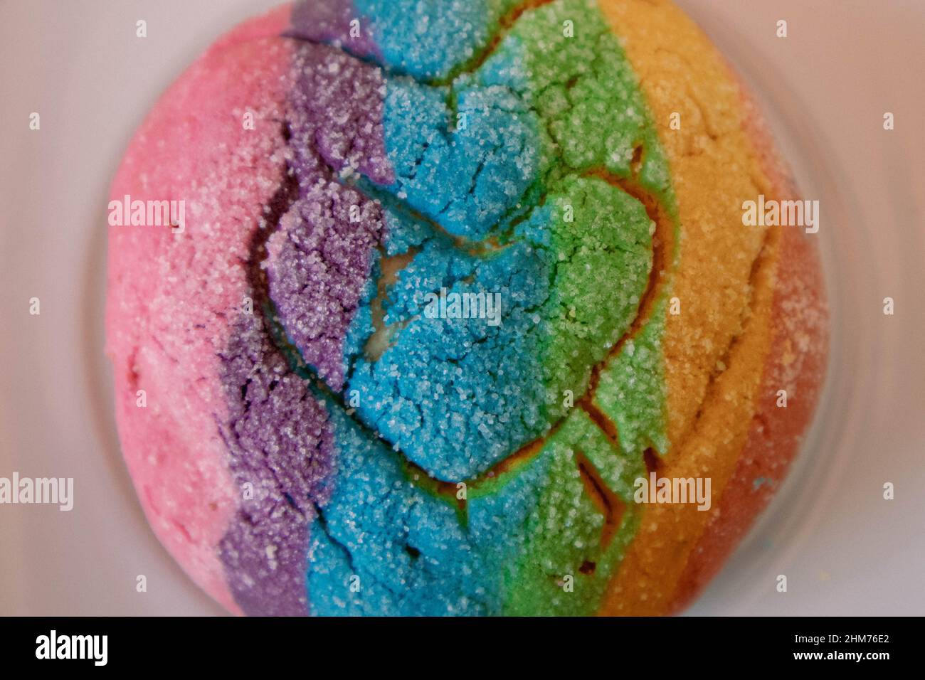 Rainbow Concha with a Heart. Mexican sweet bread with rainbow top Stock