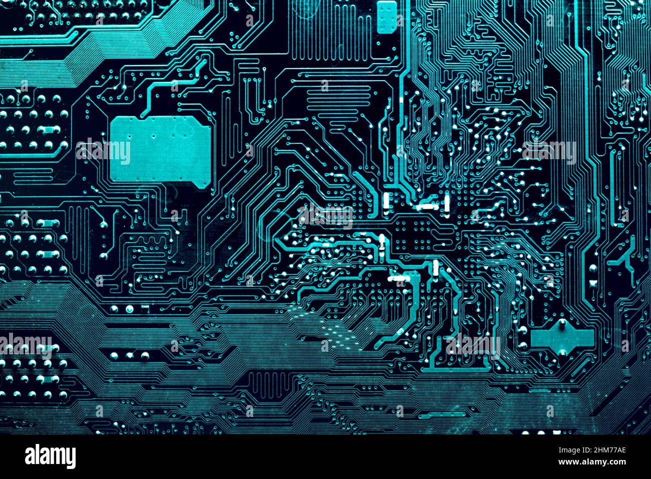 Dark background of the silhouette of the computer motherboard for the design of the company's IT site. Circuit board. Electronic computer hardware tec Stock Photo