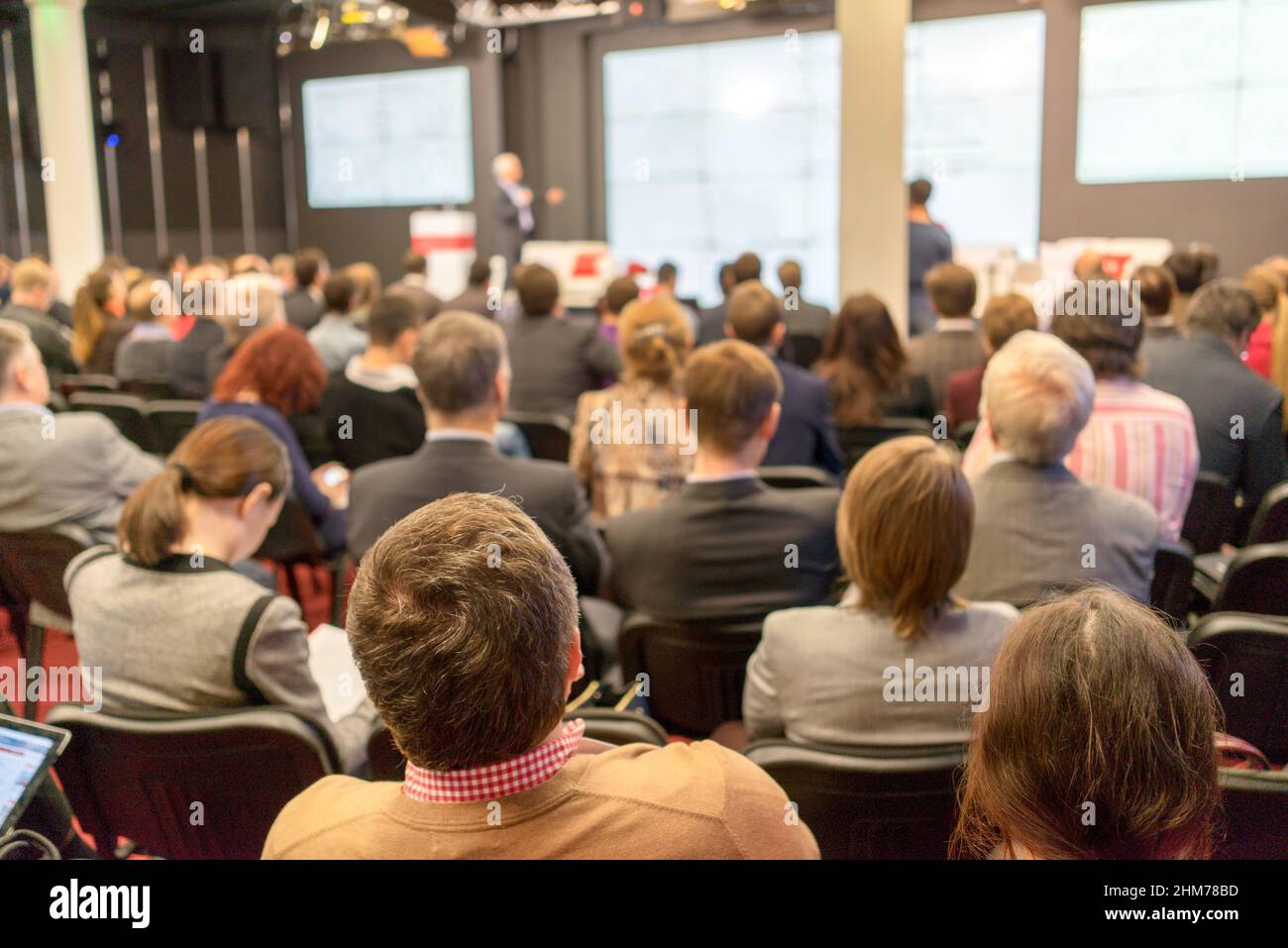 Business Conference and Presentation. Audience at the conference hall. Stock Photo